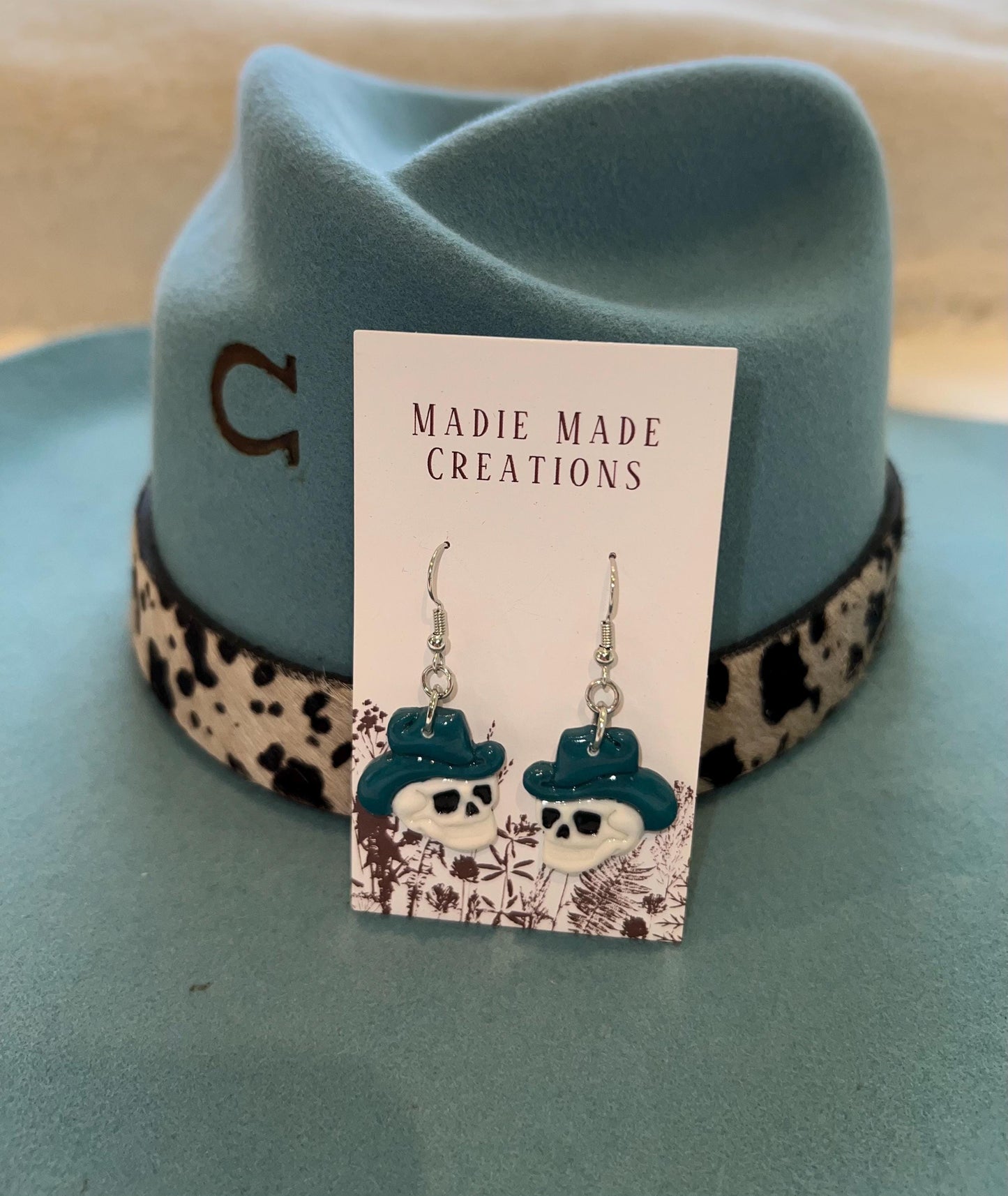 Cowboy skull dangle earrings