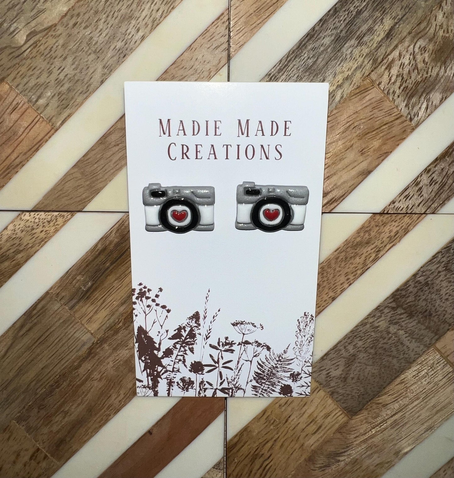 Camera stud earrings