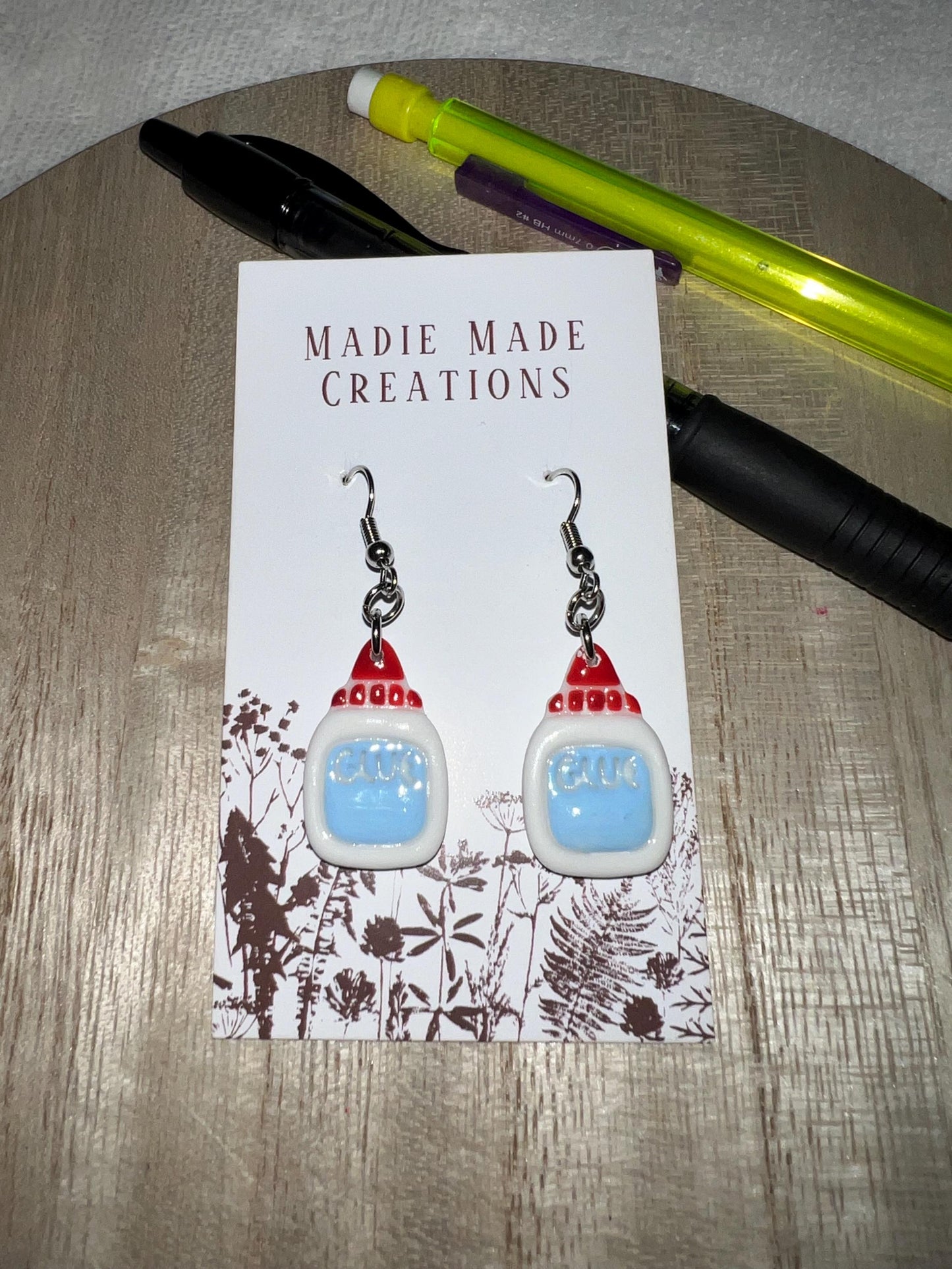 Glue dangle earrings