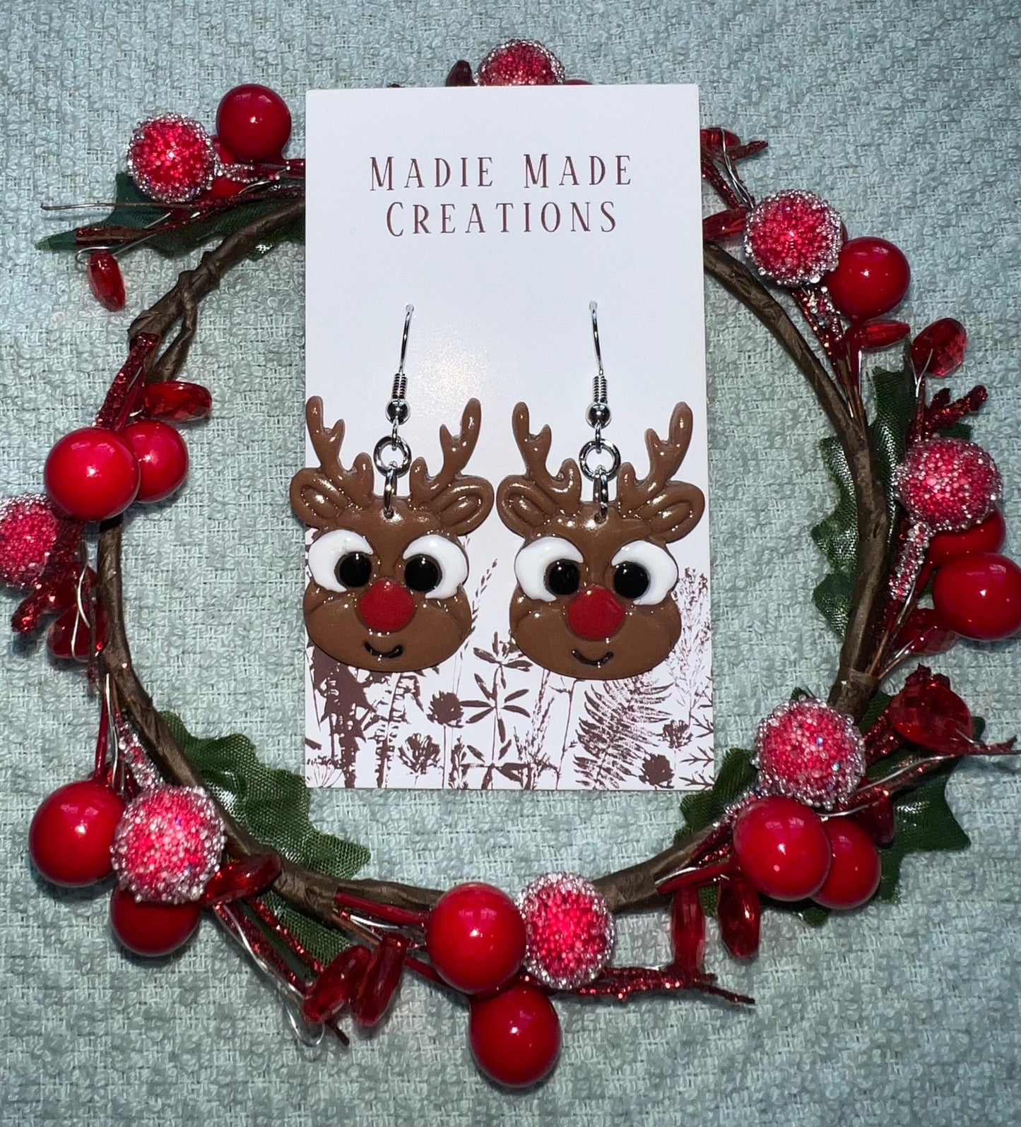 Reindeer face dangle earrings