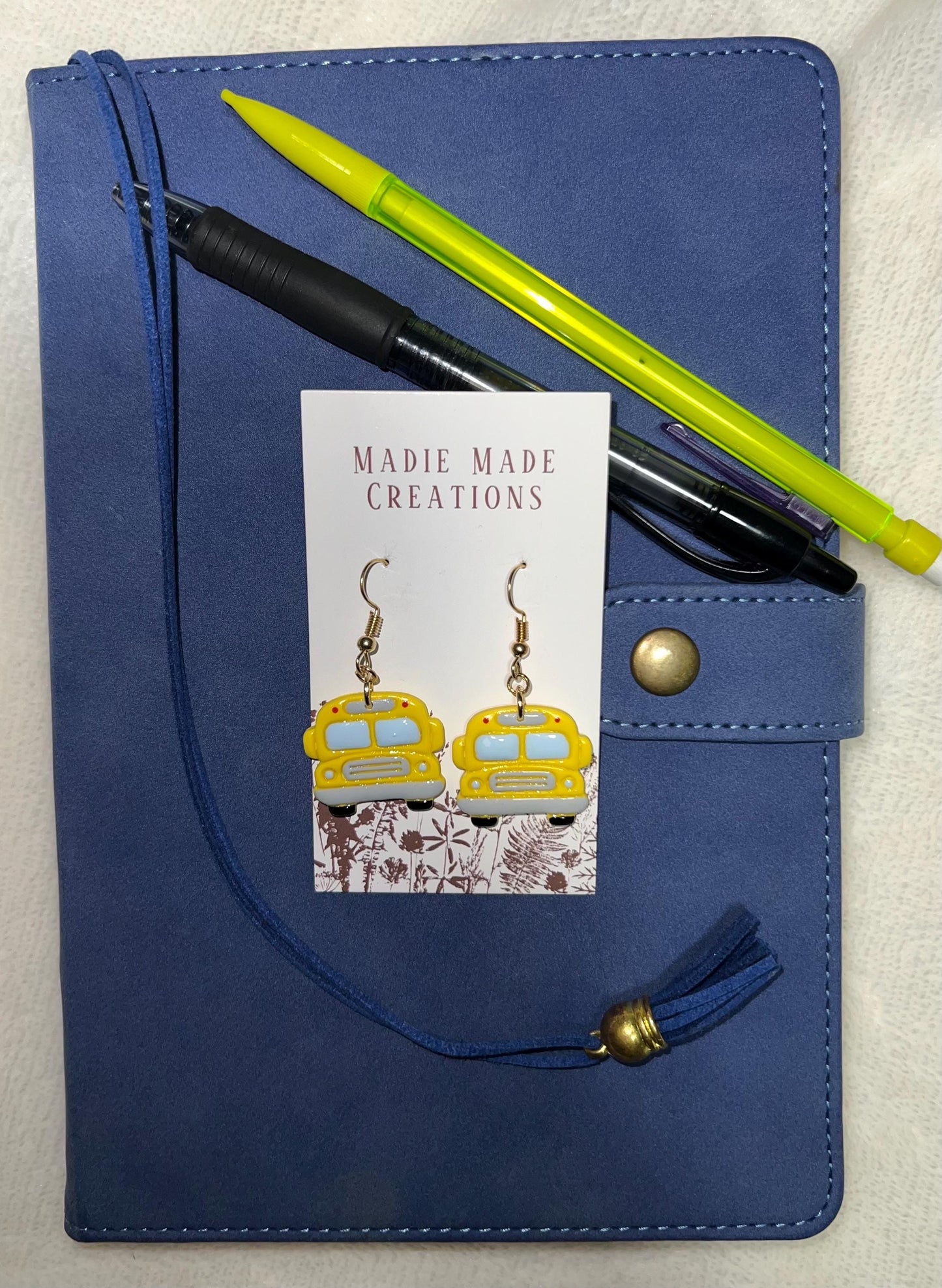 Bus dangle earrings