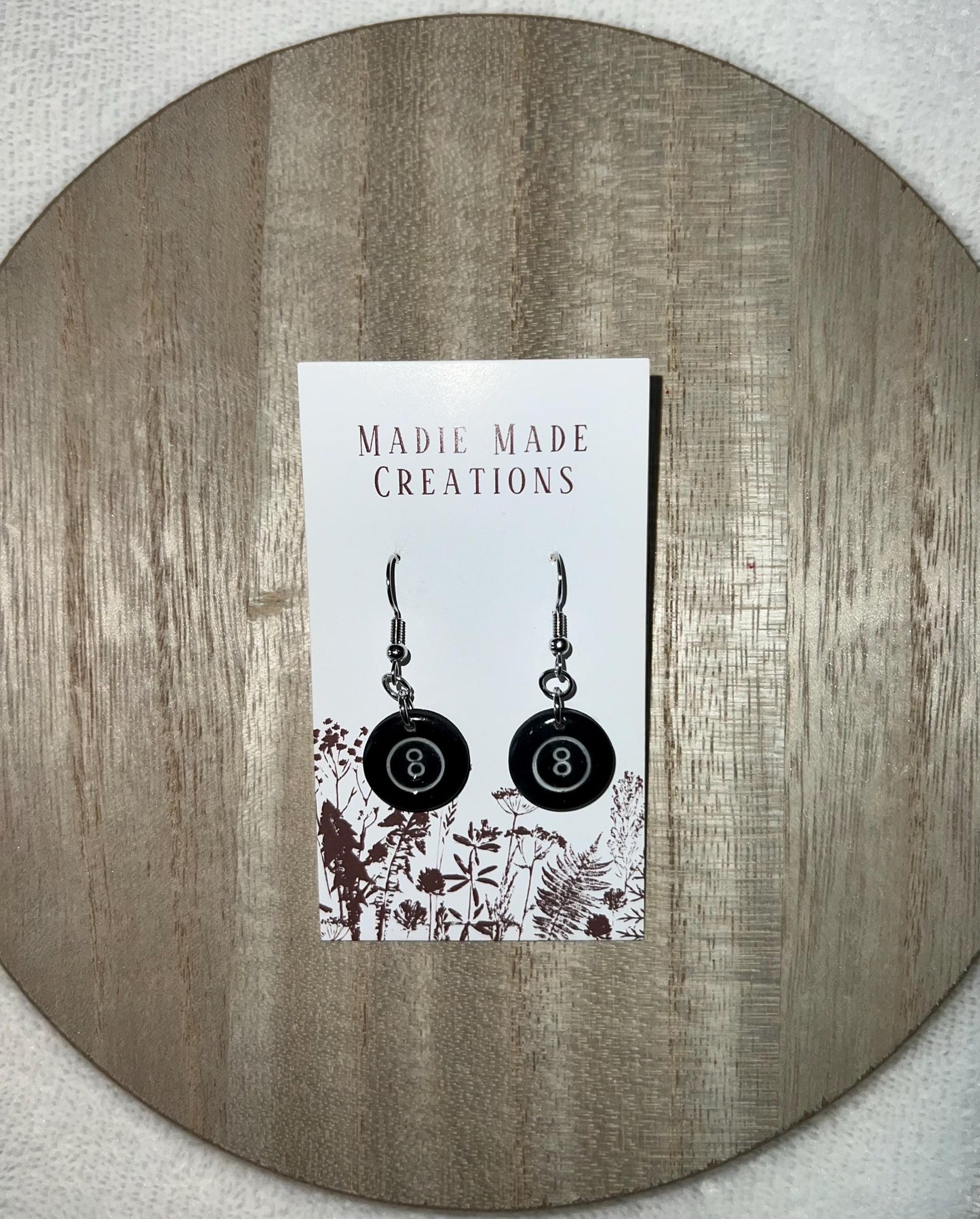 Sports themed dangle earrings