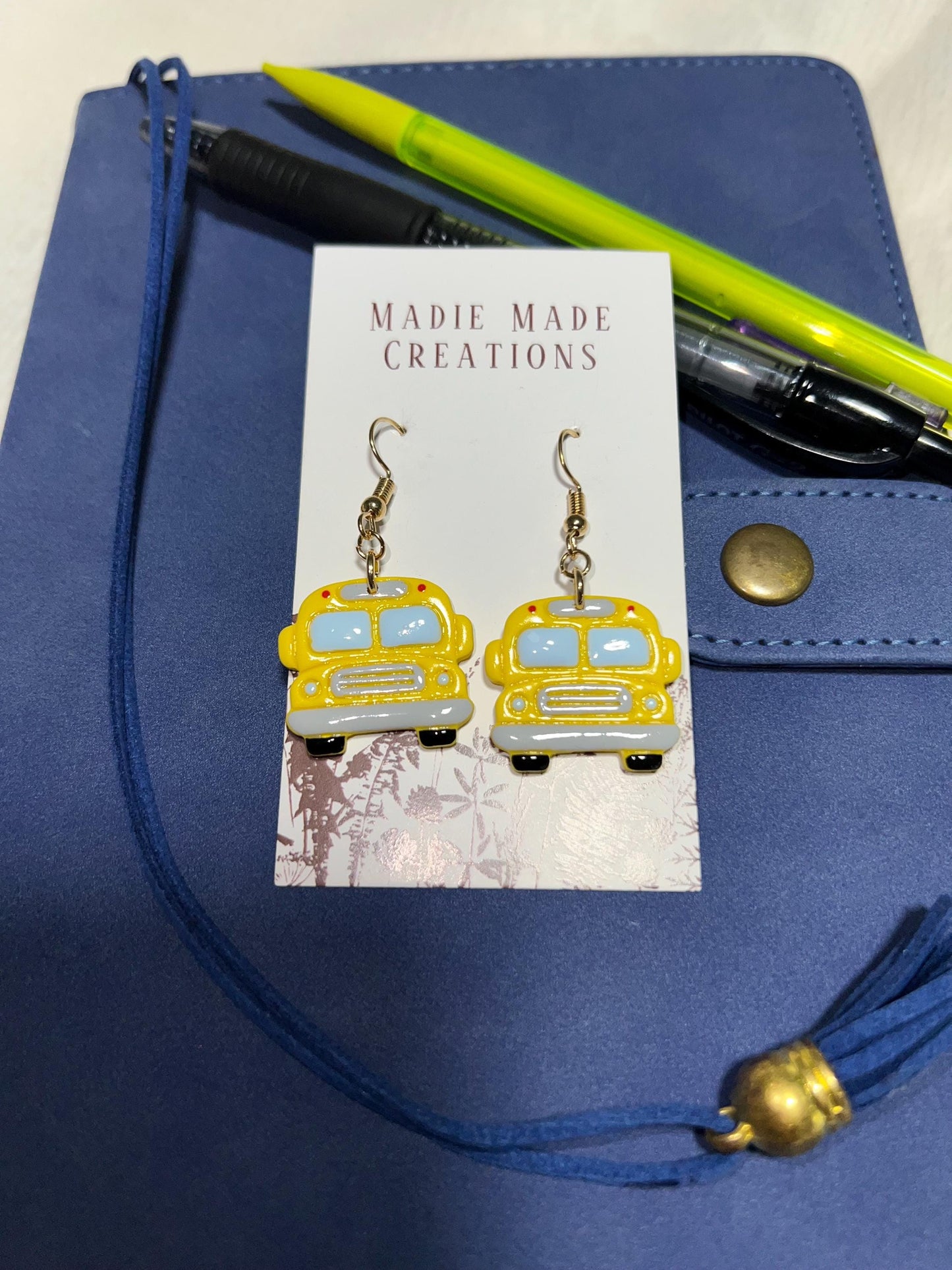 Bus dangle earrings